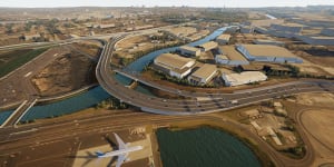 An artist's impression of the new motorway from Sydney Airport to an interchange for WestConnex at St Peters.