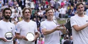 The Australian pair (left) with their runners-up plates and the champions (right).