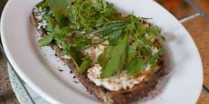 Crab on toast with herb salad.