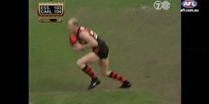 Fraser Brown tackles Dean Wallis in the dying stages of the 1999 preliminary final.