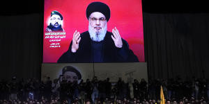 Hezbollah vows ‘definite’ response to Israeli killing of top commander