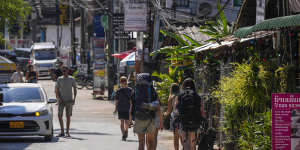 Backpacker tourists roam around in Vang Vieng,Laos.