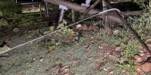 A concrete pole lies snapped at Beaudesert after the storm.
