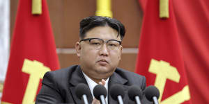 North Korean leader Kim Jong Un delivers a speech during a year-end plenary meeting of the ruling Workers’ Party.