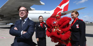 Qantas boss Alan Joyce has defended the airline's decision to remove references to Taiwan as a separate country.