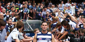 Tom Hawkins used a phone in the Geelong rooms on Monday but the Cats have only received a warning.
