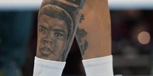 A tattoo of Muhammad Ali on Harry Garside’s leg.