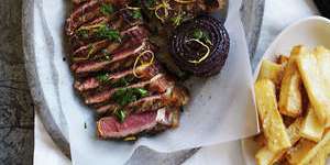 Neil Perry's barbecued beef sirloin with onion,parsley and lemon salad.
