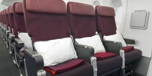 Qantas charges a fee to book the exit row,but the fee is not refundable.