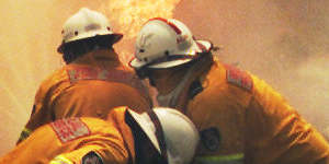 NSW volunteer rural firefighters fight a fire in Springwood,Blue Mountains in January 2002. The deadly fire season followed back-to-back La Nina summers. 
