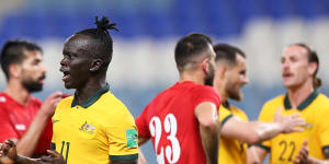 Awer Mabil celebrates what proved to be the winner for Australia near the 70-minute mark.