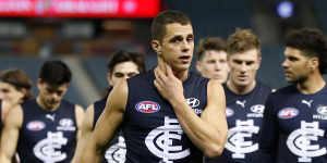 Ed Curnow leaves the field after his 200th match in round 19. 