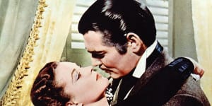 Gone with the Wind. Rhett Butler played by Clark Gable and Scarlett O'Hara played by Vivien Leigh.