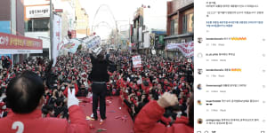 Yoon rallies the crowd in Seoul. 