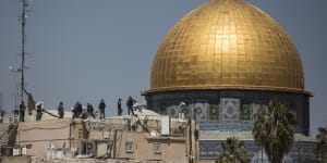 Clashes mar holy days as Israeli police enter flashpoint Jerusalem mosque