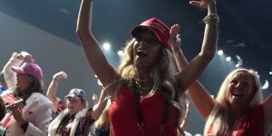 Supporters dance to the song Y.M.C.A. after Republican presidential candidate former President Donald Trump speaks at the Turning Point Believers’ Summit