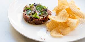Hand-chopped beef tartare is available at lunch.