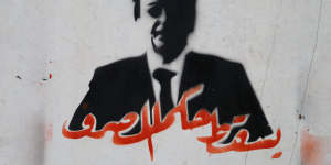 A stencil on the door of Lebanon's central bank in Beirut demands the ousting of Riad Salameh,the bank's governor.
