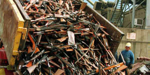 A truck unloads prohibited firearms at a scrap metal yard in 1997 after the Port Arthur massacre a year earlier.