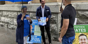 Campaigning outside Brisbane City Hall. The divide between capitals and regions,and between the inner cities and outer urban areas,has only sharpened.