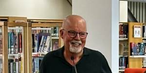 Bestselling crime author Michael Robotham addresses readers at an independent bookseller’s event.