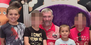 Heartbroken father Joseph Shorey (seated) with Sheldon (right) and Shane (far left). Both boys died in an alleged hit and run accident in Wellington on January 5. 