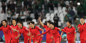 South Korea celebrate after the penalty shootout win over Saudi Arabia.
