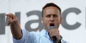 Alexei Navalny firing up a crowd during a political protest in Moscow in 2019.