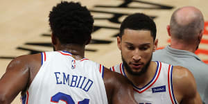 Joel Embiid has offered an olive branch to Ben Simmons (right).