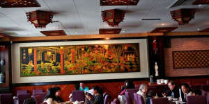 The dark and elegant dining room at Tao Tao House.