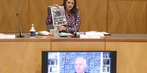 Committee chair Senator Sarah Hanson-Young holds up a front page of the Daily Telegraph as she puts a question to former prime minister Malcolm Turnbull during a hearing on media diversity.
