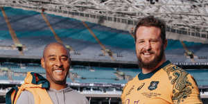 George Gregan and James Slipper standing at Accor Stadium. The pair are current joint holders for the record for most Wallabies caps,with 139.