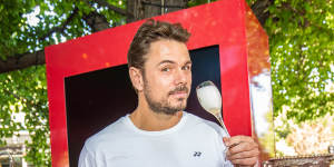 Tennis star Stan Wawrinka pops a bottle of Piper-Heidsieck champagne.