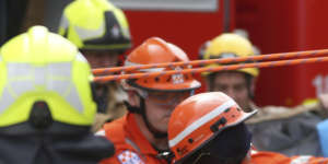 Emergency service workers at the scene of the tragedy. 