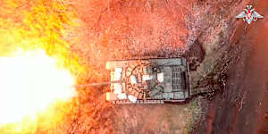 A Russian tank fires on Ukrainian positions in the Belgorod region.