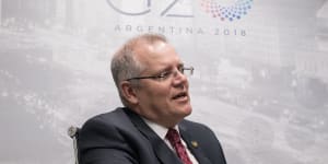 Growth on track despite'heightened'trade war risk,says Scott Morrison from G20