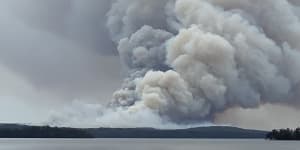 ‘Remain vigilant’:Out of control fire burns through South Coast national park