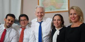 Julian Assange,centre,with Stella Moris,right,and barrister Jennifer Robinson,far right,and his Ecuadorian counsel Carlos Poveda,left,in an undated picture supplied by WikiLeaks.