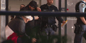Moahmmed Skaf escorted from Bankstown Hospital by police. The notorious gang rapist has been accused of directing a group engaged in alleged drug supply.