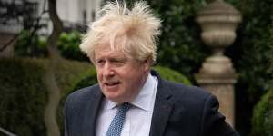 Boris Johnson leaves his home on March 21,2023.