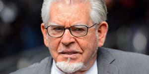 Veteran entertainer Rolf Harris,arrives at Southwark Crown Court to be sentenced,in London,Friday,July 4,2014. Australian-born Harris,84,was found guilty of 12 counts of indecent assault on four victims aged 19 or under between 1968 and 1986.