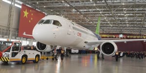 SHANGHAI,CHINA - NOVEMBER 02:(CHINA OUT) China's first self-developed large passenger jetliner C919 is presented after it rolled off the production line at Shanghai Aircraft Manufacturing Co.,Ltd on November 2,2015 in Shanghai,China. The C919 jet developed by Commercial Aircraft Corporation of China,Ltd. (COMAC) is scheduled to make its maiden flight in 2016.. (Photo by VCG/VCG via Getty Images) China's C919 airliner