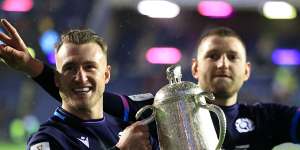 Stuart Hogg and Finn Russell of Scotland celebrate with the Calcutta Cup.