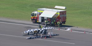 A vintage biplane has crashed at Shellharbour Airport,landing upside down on the runway while attempting to touch down.