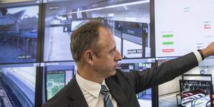 Transport Secretary Rodd Staples in the operations control centre for the metro line at Rouse Hill.