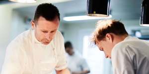 On a mission:Dan Hunter (left) in the kitchen at Brae.