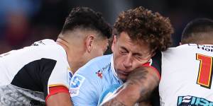 SYDNEY,AUSTRALIA - APRIL 26:Mark Nawaqanitawase of the Waratahs is hit high by Etene Nanai-Seturo of the Chiefs during the round ten Super Rugby Pacific match between NSW Waratahs and Chiefs at Allianz Stadium,on April 26,2024,in Sydney,Australia. (Photo by Mark Kolbe/Getty Images)
