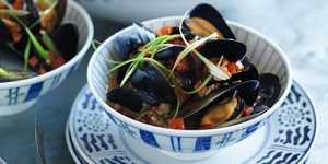 Stir-fried mussels with red bean curd and chillies.