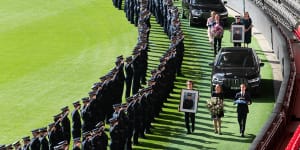 ‘Police are human,they cry,they suffer’:Force,families honour officers killed on Eastern Freeway