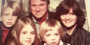 Mike Baird (left) as a child with dad Bruce,mum Judith,who died earlier this year,and siblings Julia and Steve.